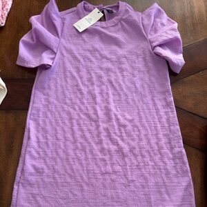 Beautiful purple dress. Never worn with tags.